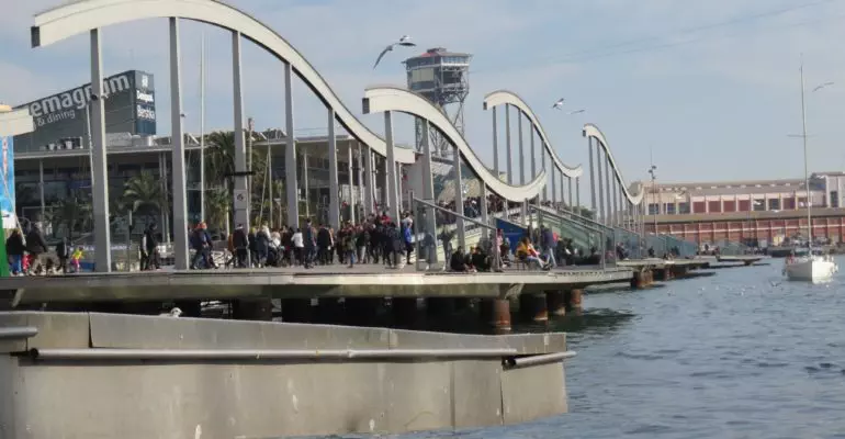 A Barcelona real estate bridge over a body of water.