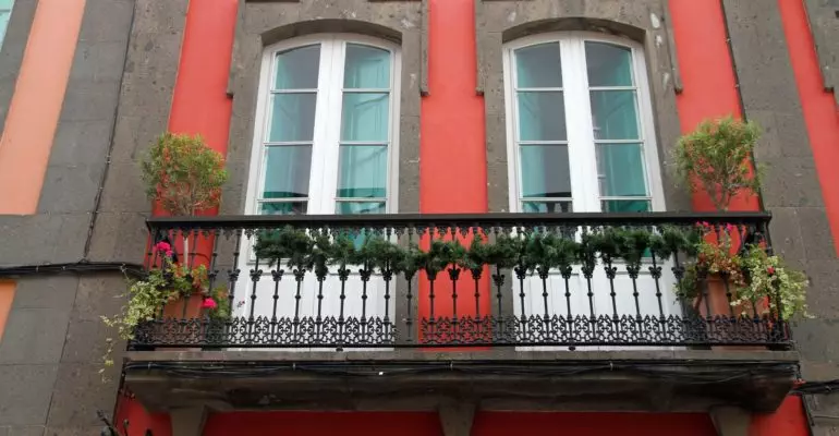 The Spanish property building is red.