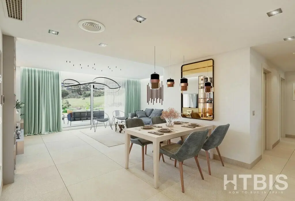 A modern living room with a dining table and chairs in a new build apartment in Fuengirola.