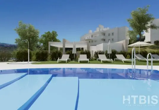 A 3d rendering of a swimming pool in front of a Malaga New Build apartment building.