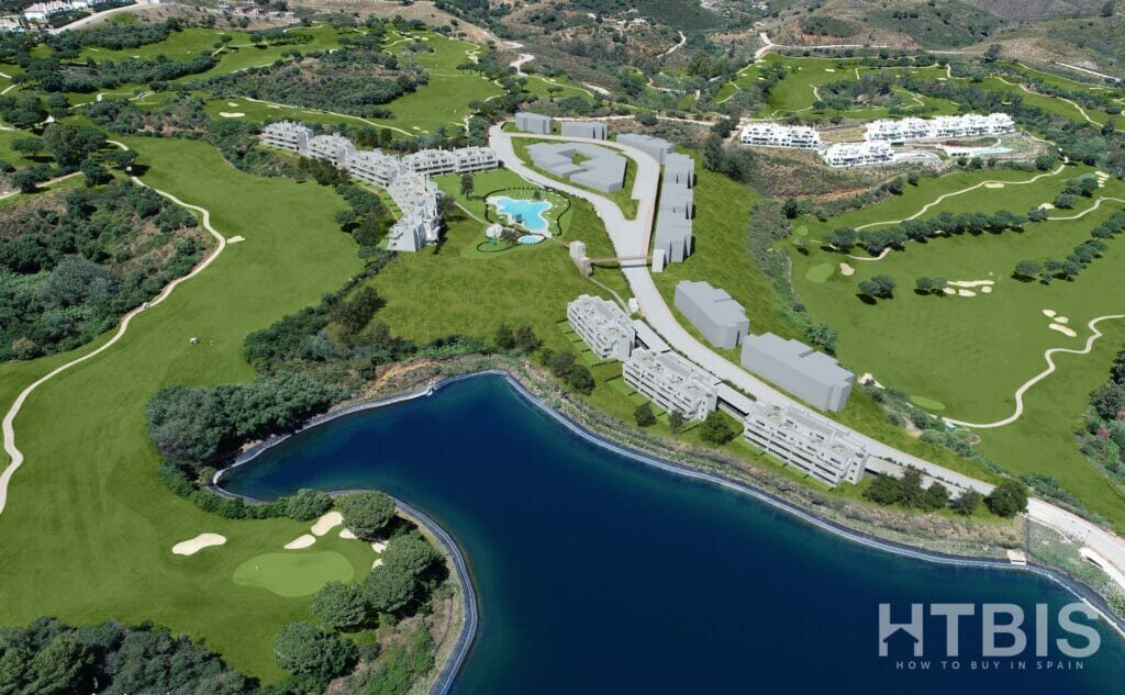 An aerial view of a golf course and a lake, with Malaga New Build Apartments in the background.