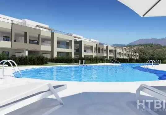 A 3D rendering of an apartment complex with a swimming pool near the Estepona Golf Course.