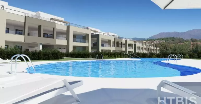 A 3D rendering of an apartment complex with a swimming pool near the Estepona Golf Course.