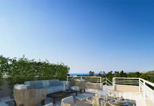 A 3D rendering of a terrace in an apartment with furniture and a view of the ocean.