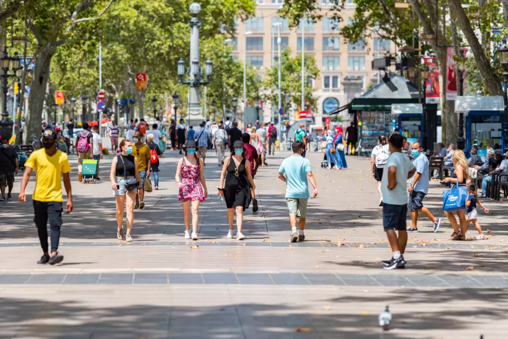 People walking through empty streets after COVID 19 in Barcelona, Spain.