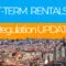 Skyline view of a city with text: 